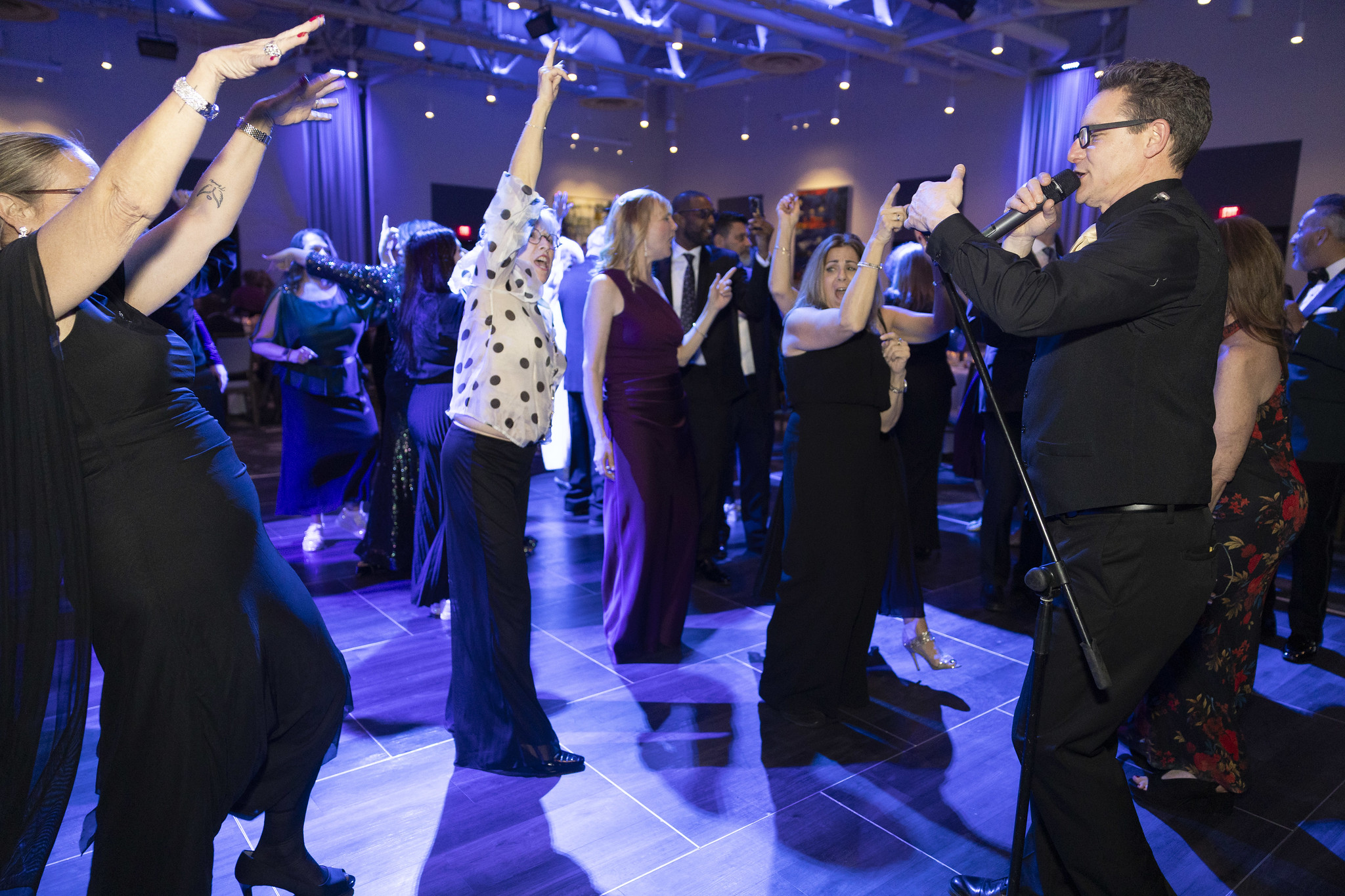 Masquerade band on stage at wedding venue