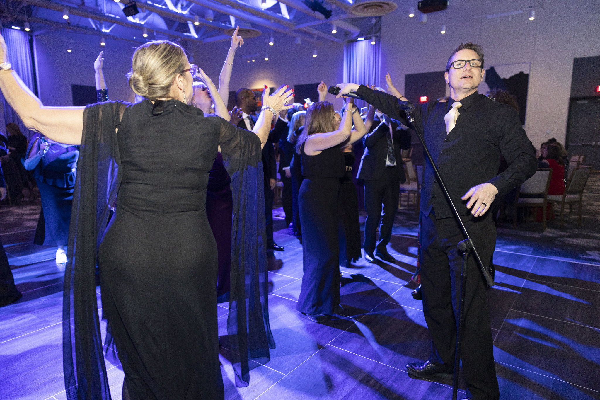 Masquerade band singers and musicians at wedding reception